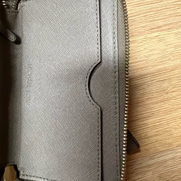 Michael Kors wristlet wallet taupe color good used condition. Gold slightly worn - Picture 5 of 6
